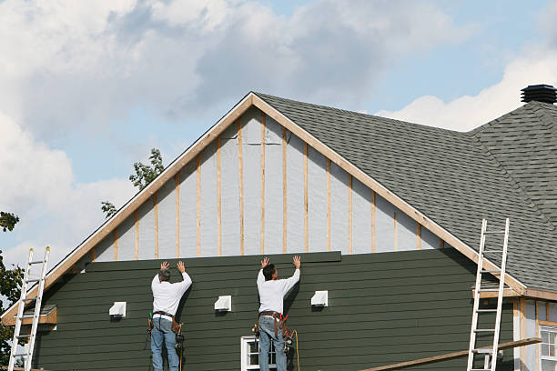 Professional Siding Installation technician working in Strongstown, PA